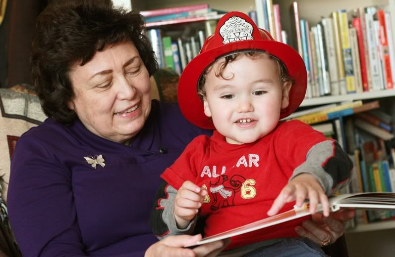 Grandma toddler reading a book